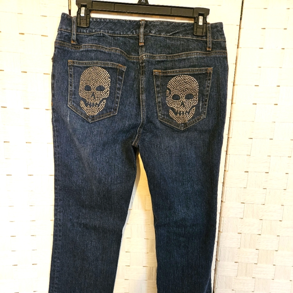 Skull embellished jeans by INC